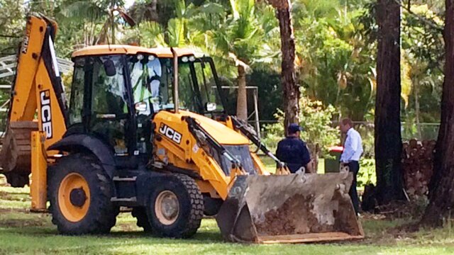 Police bring in an excavator to help with the search for William Tyrell