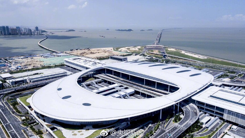 An aerial shot of a terminal leading to the world's longest bridge from China to Hong Kong.