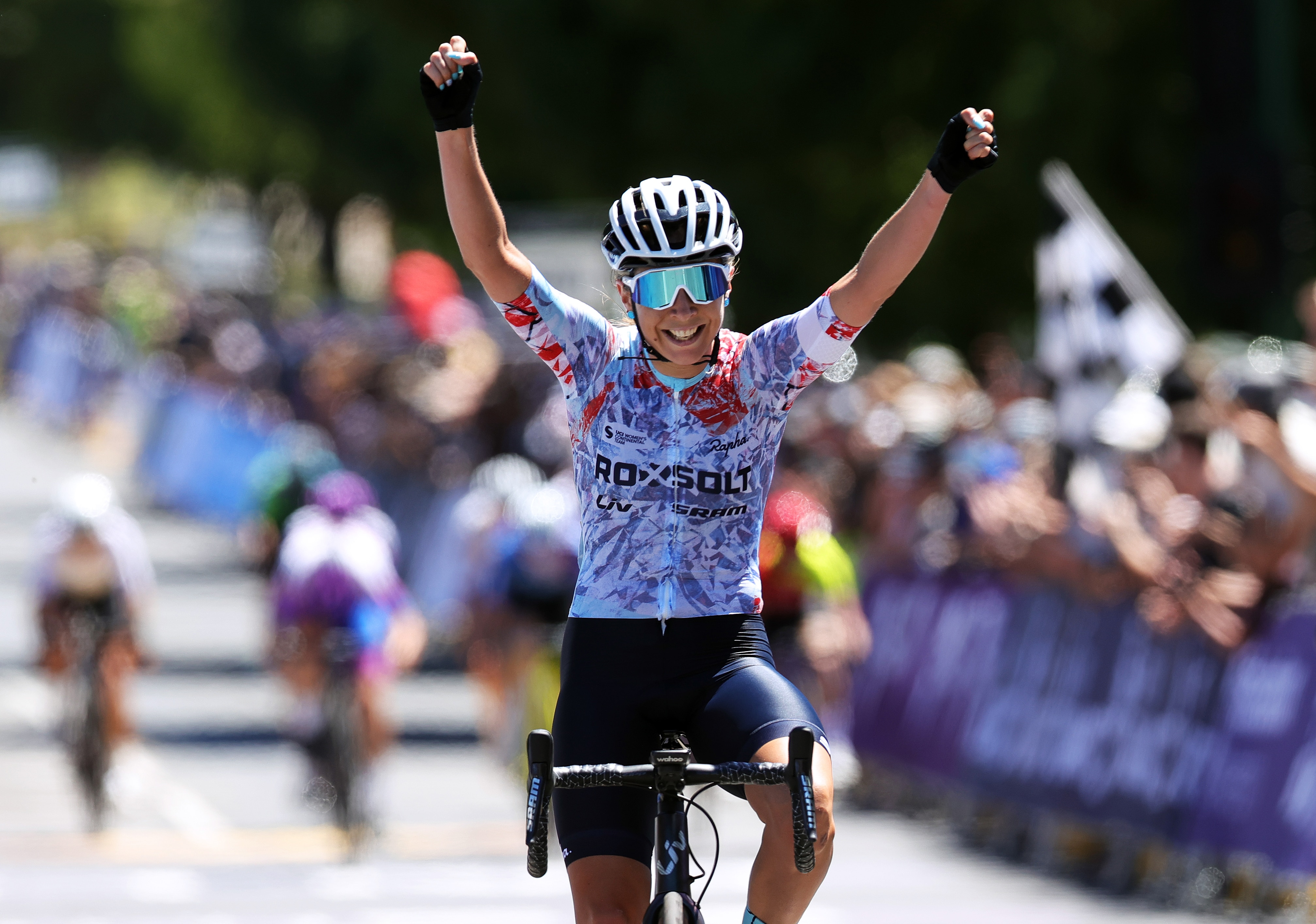 Australia's Nicole Frain celebrating at finish line as race winner during the Australian Cycling National Championships
