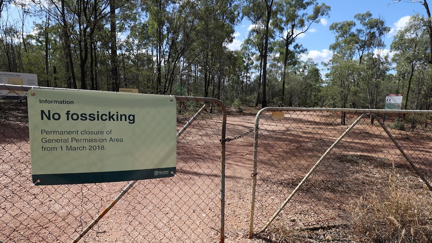 A sign on a fence in central Queensland in Clermont saying the area is closed to gold fossickers