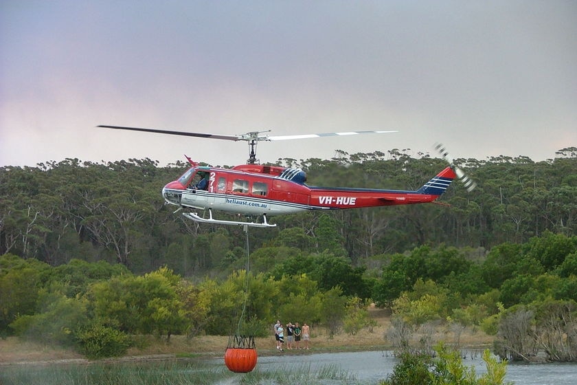 Fire-fighting chopper fills up at Burrill Lake