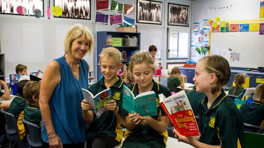 Renmark West principal Judy Cottam with students Ethan, Izabel and Jorja.