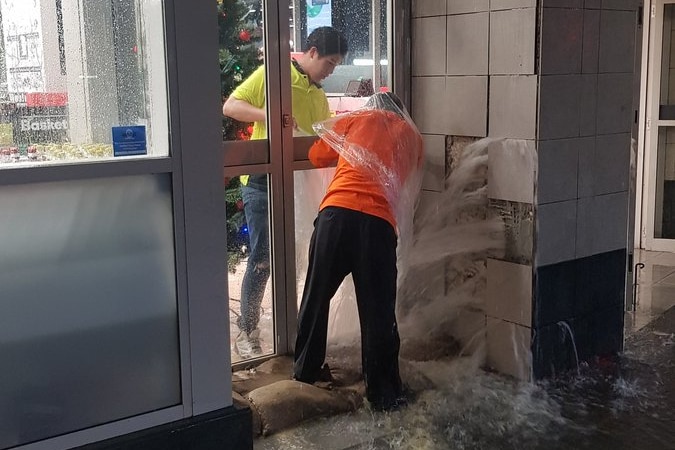 Flooding bursting through a wall