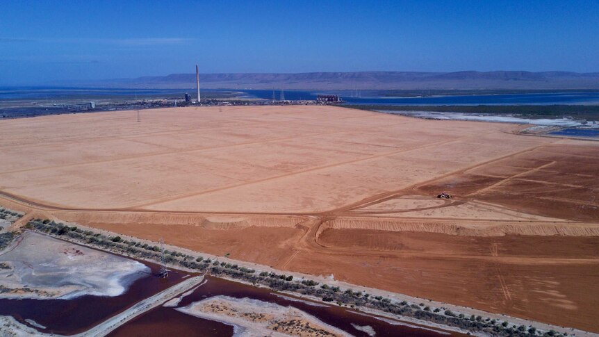 Brown soil covers a large area at the Port Augusta power station