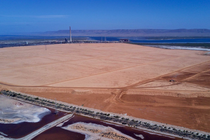 Brown soil covers a large area at the Port Augusta power station