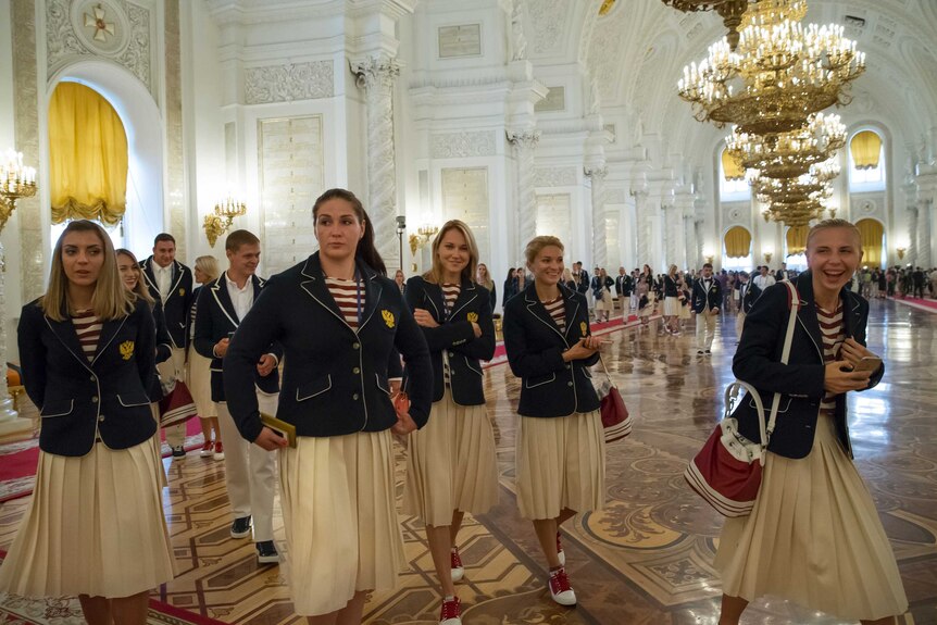 Russian athletes gather at the Kremlin