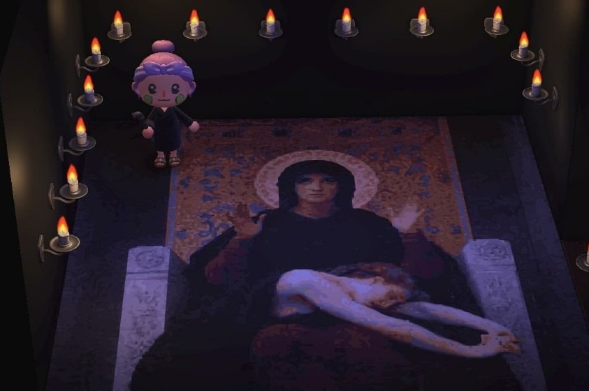 A 3D game character with pink bun wears black gown and stands in black room lined with candles and a neoclassical floor mural.