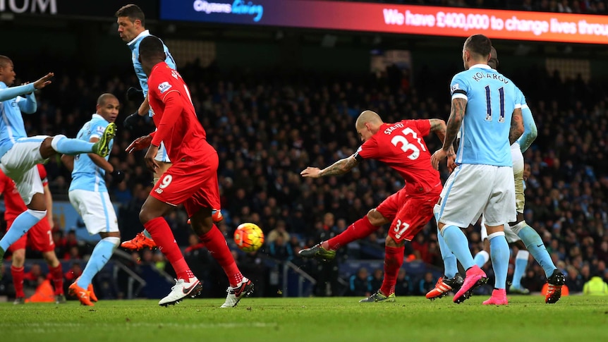 Martin Skrtel scores in Liverpool's 4-1 Premier League win over Manchester City.