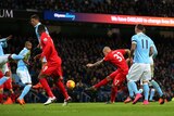 Martin Skrtel scores in Liverpool's 4-1 Premier League win over Manchester City.