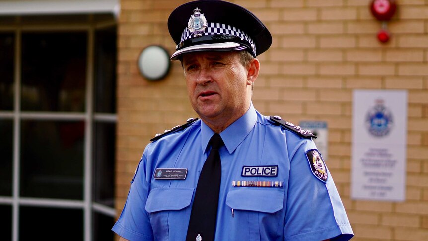 Acting Commander Brad Sorrell speaks in front of the Armadale police station.