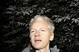 WikiLeaks founder Julian Assange speaks to the media outside Ellingham Hall