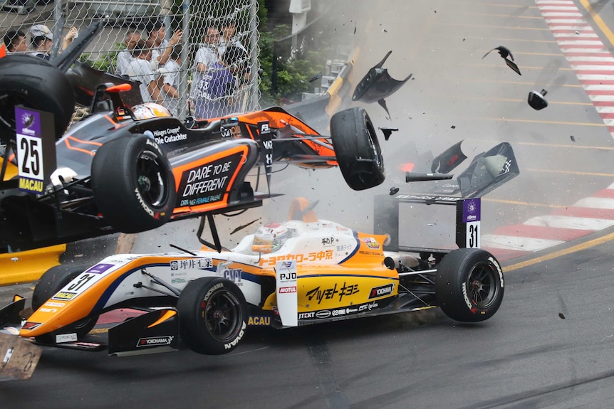 Sophia Floersch's Formula Three car crashes over Sho Tsuboi's.