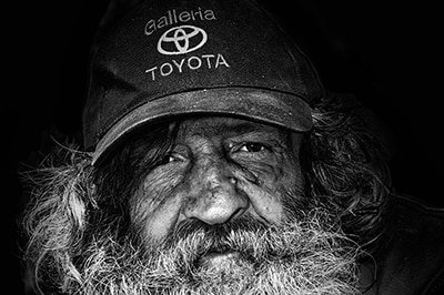 Homeless man in black and white portrait