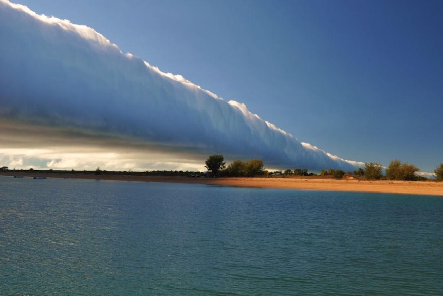 The morning glory cloud forms over Sweers Island.