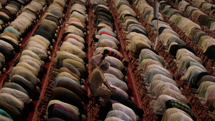 Worshippers pray at a mosque in Pakistan