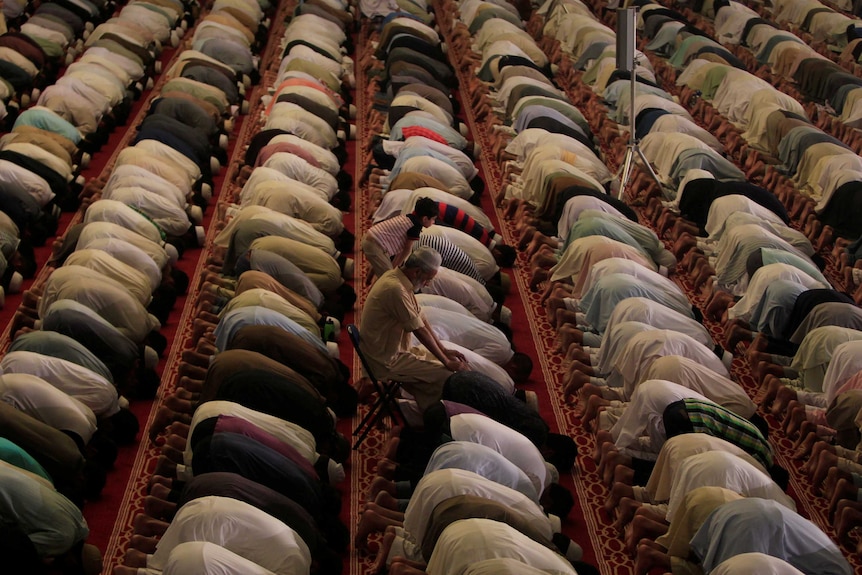 Worshippers pray at a mosque in Pakistan