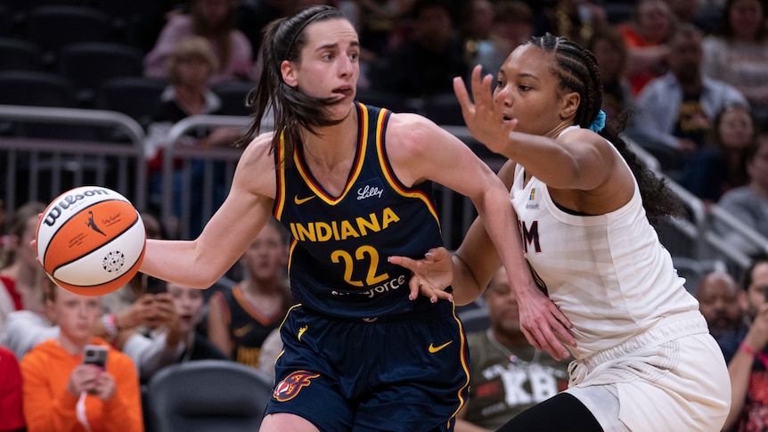 Caitlin Clark playing for Indiana Fever in WNBA preseason game.