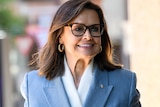 A close-up of Lisa Wilkinson smiling.
