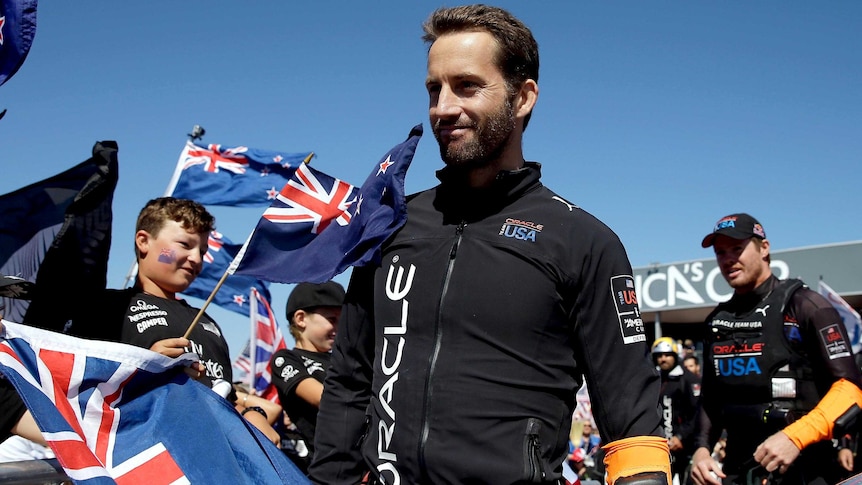 Sir Ben Ainslie of Oracle Team USA walks through the crowd before an America's Cup final race.