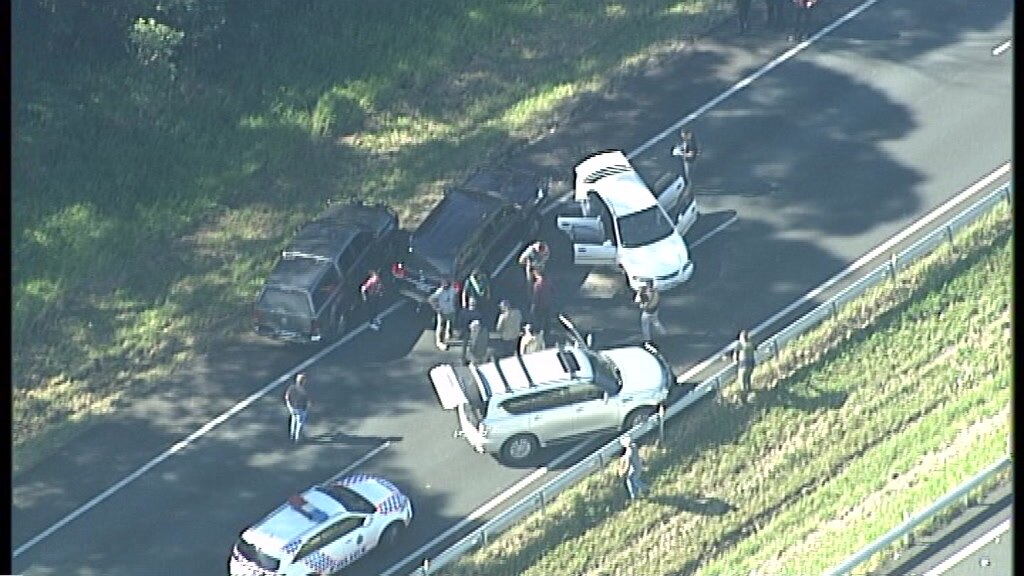 Alleged carjacker critical after being shot by police on Bruce Highway ...