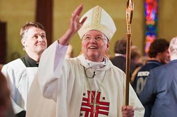 Bishop Greg O'Kelly attends a mass.