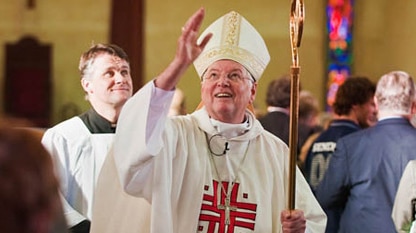 Bishop Greg O'Kelly attends a mass.