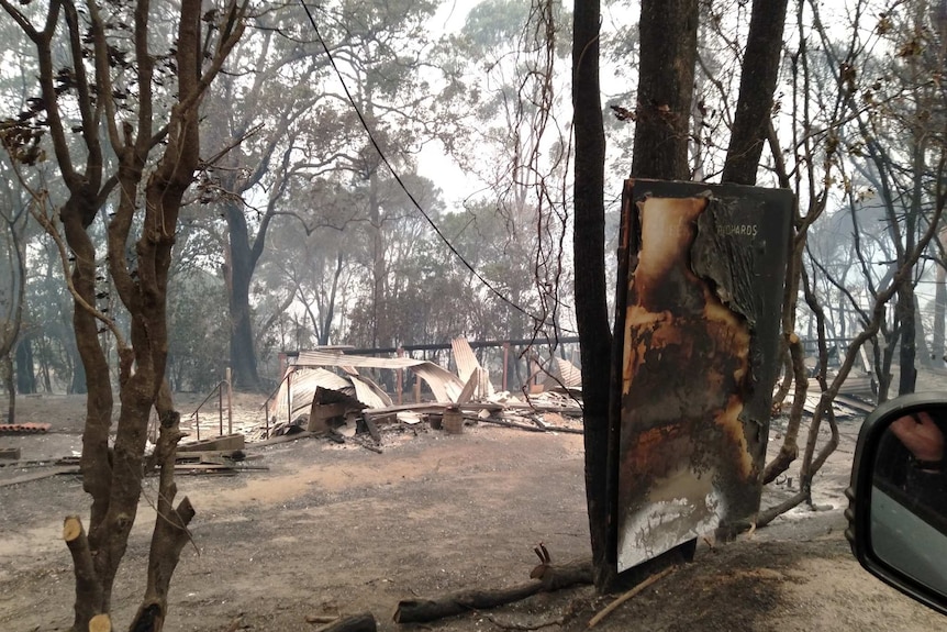 The ruins of a house destroyed by fire.