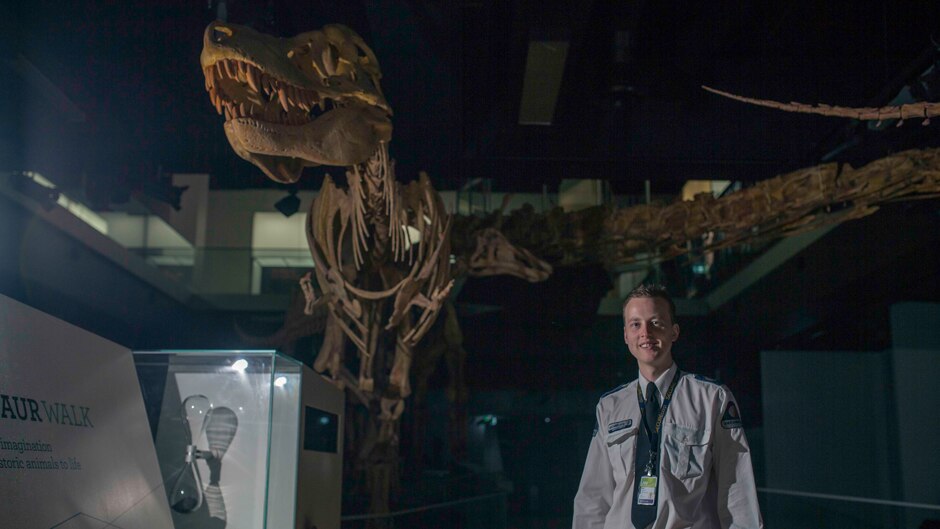 Melbourne Museum night guard Maximillian Gustew on the dinosaur walk.