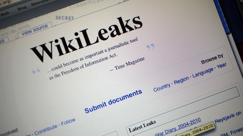 A cursor highlights a part of the homepage of the WikiLeaks.org website