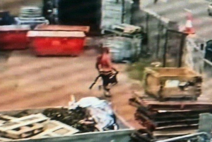 CCTV image of a shirtless man