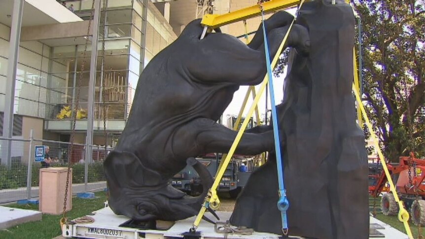 Brian Jungen's bronze sculpture 'Couch Monster' installed outside