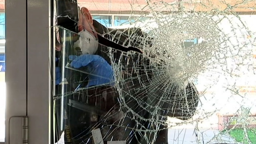 A broken window in Alice Springs