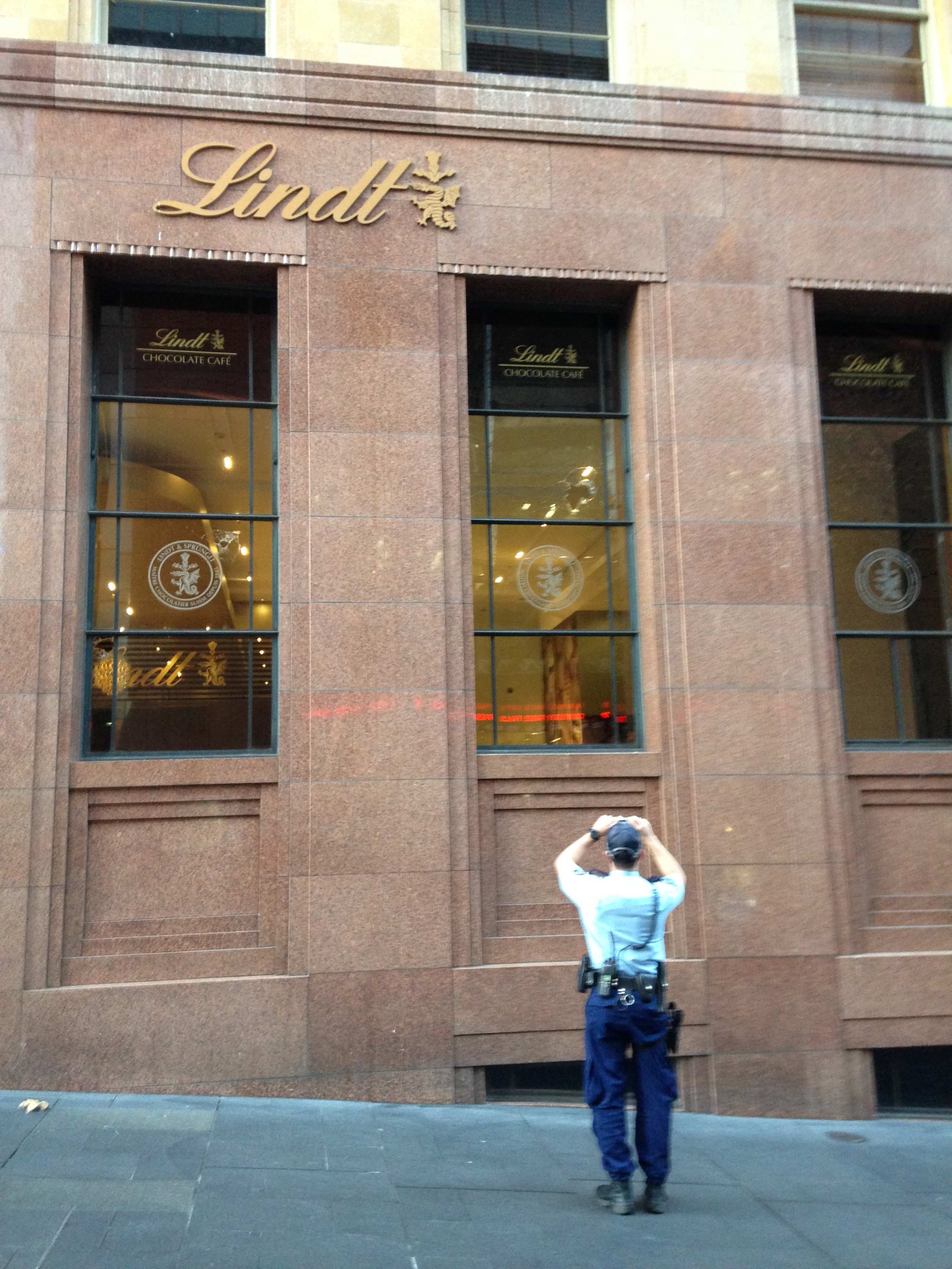 Man charged over vandalism of Lindt Cafe in Sydney's