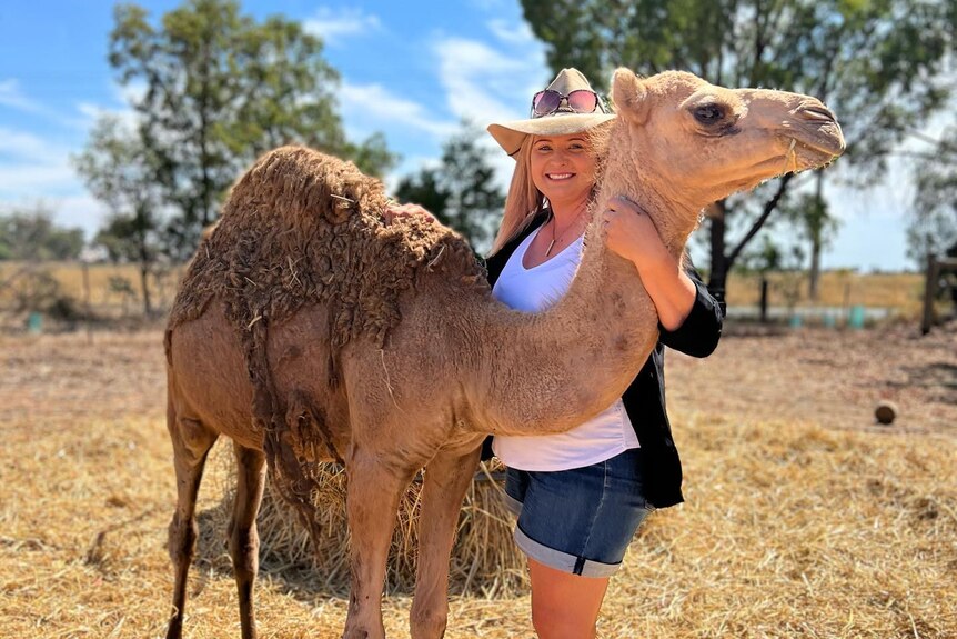 Megan Williams with a camel