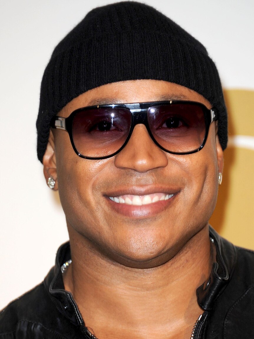 LL Cool J poses for photos at the Grammy Nominations Concert.