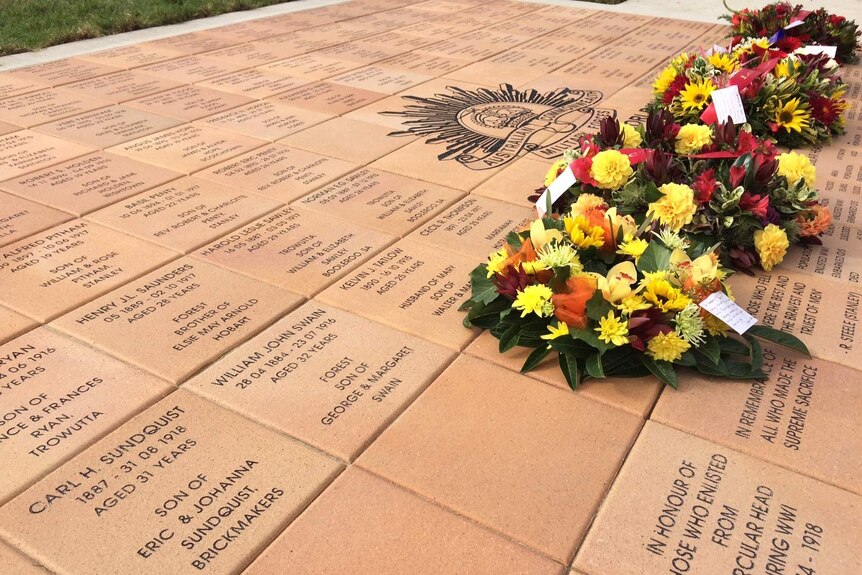 Wreaths laid on the new memorial in Stanley, Tasmania