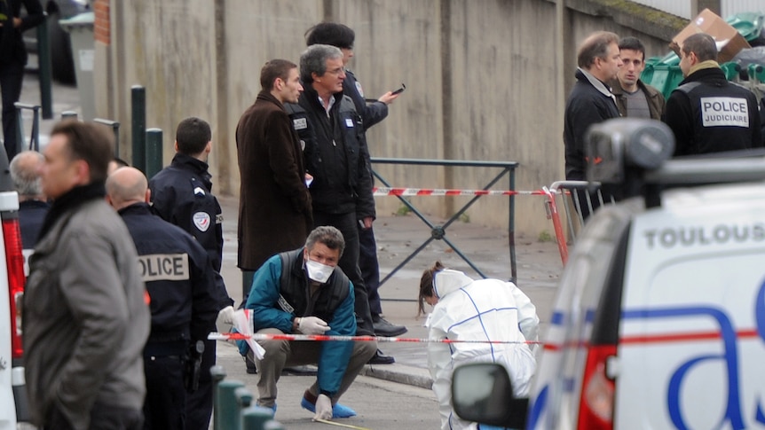 Police inspect the scene of the French school shooting