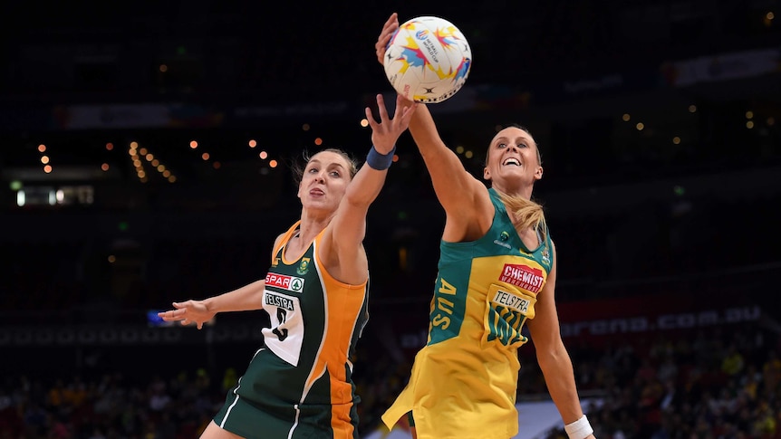 Renae Hallinan (right) of Australia competes for the ball with Erin Burger of South Africa