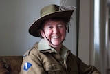 Sally Cripps from Blackall is in full Light Horse uniform, with slouch hat and water bottle.