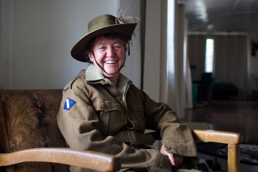 Sally Cripps from Blackall is in full Light Horse uniform, with slouch hat and water bottle.