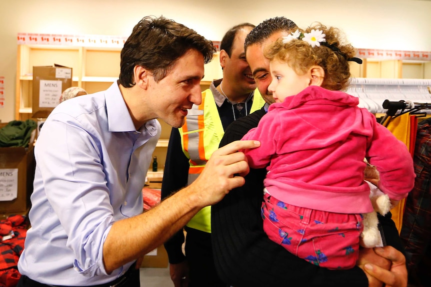 Canada's PM Justin Trudeau welcomes Syrian refugees