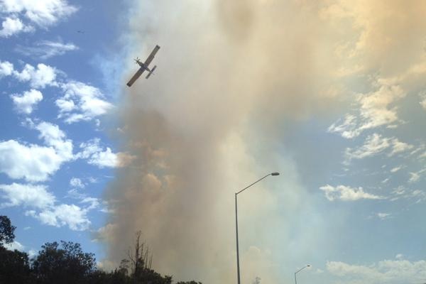 Bushfire forces partial closure of Perth's Kwinana Freeway in Perth's south.