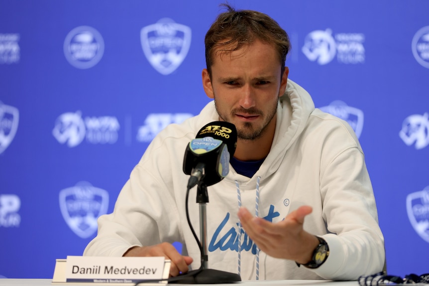 Daniil Medvedev gestures as he answers press conference questions at the Cincinnati Masters