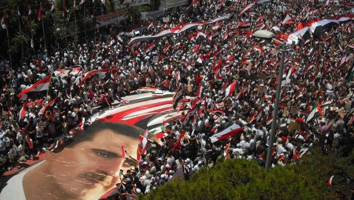 A pro-Bashar al-Assad demonstration in Latakia, Syria