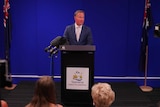 Tasmanian Premier Will Hodgman stands in front of the press in Hobart as he announces his resignation.
