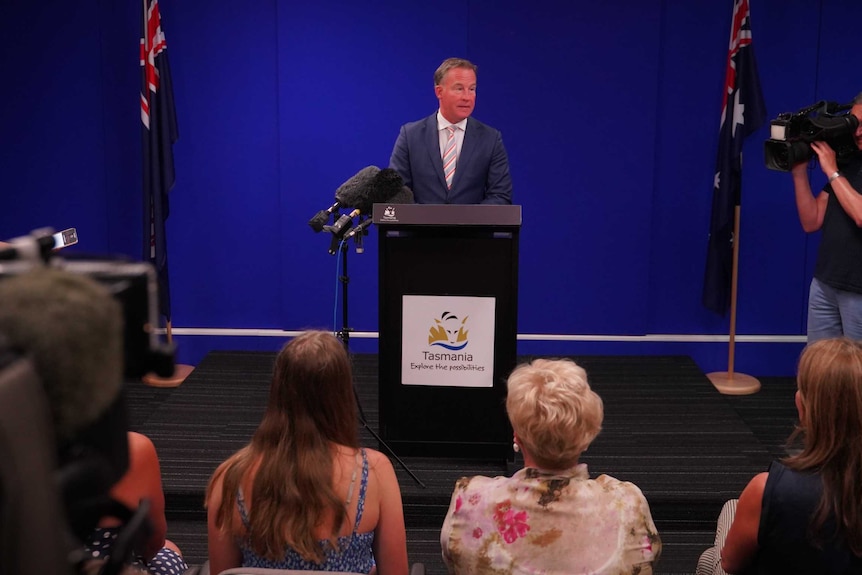 Tasmanian Premier Will Hodgman stands in front of the press in Hobart as he announces his resignation.