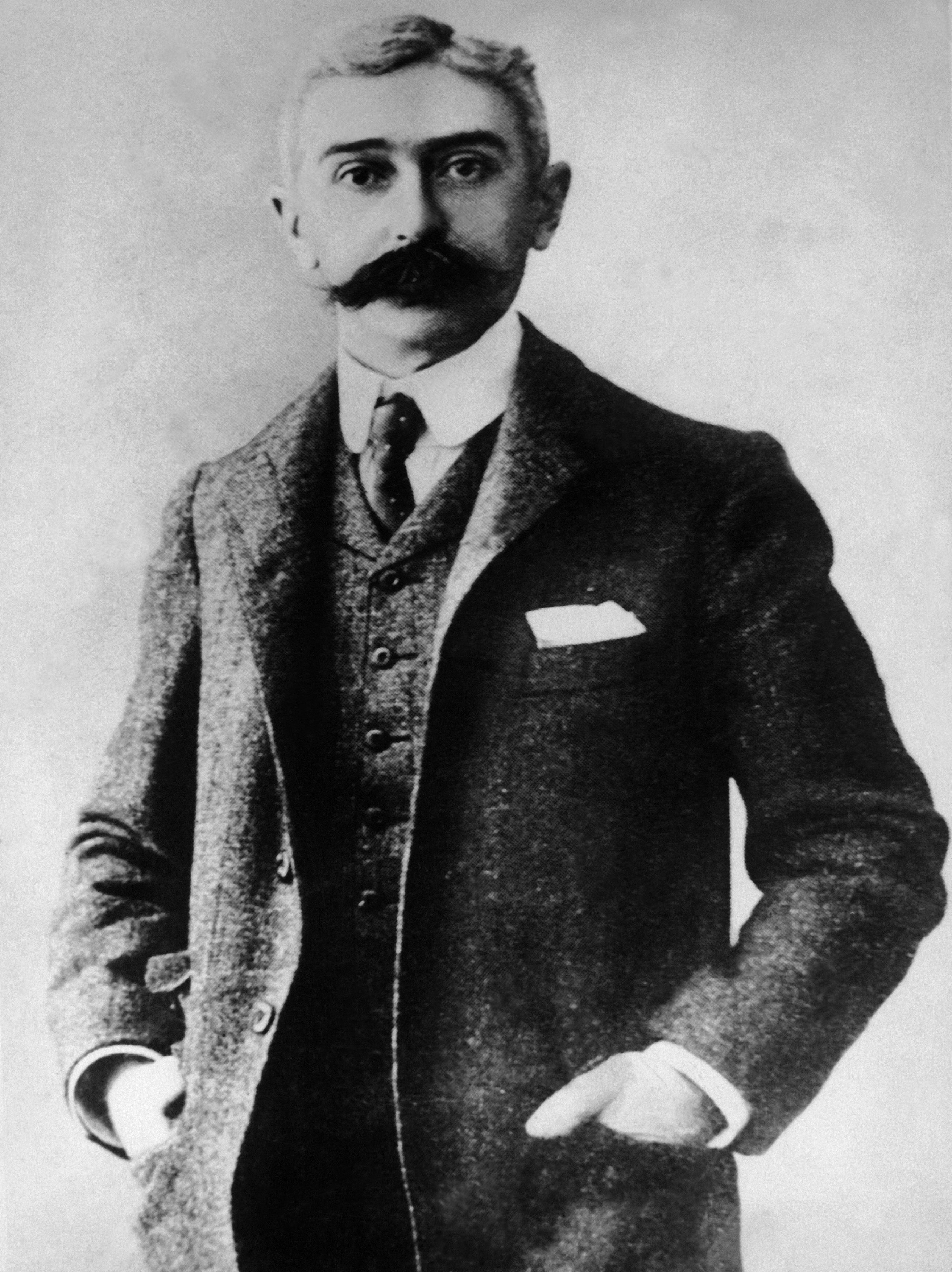 Black and white picture of man with a heavy moustache 