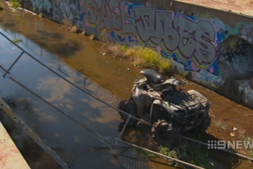 Crashed quad bike