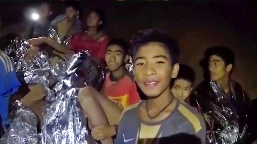 Thai boys in high spirits as rescuers plan next move.