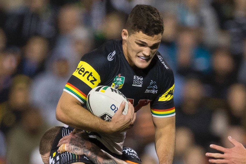 Nathan Cleary is tackled by the Wests Tigers.